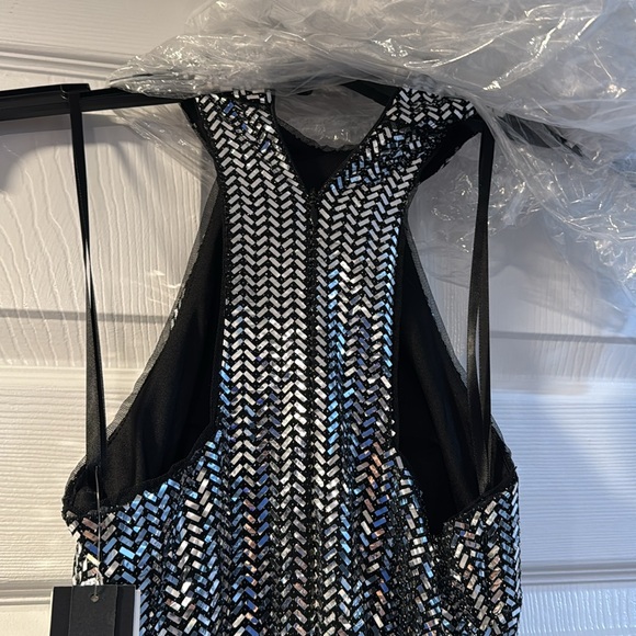 Silver Sequin Gown never worn size 0 purchased at Bloomingdale’s. - Picture 9 of 11